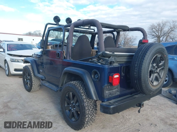 2001 Jeep Wrangler Sport with VIN 1J4FA49S41P334053, listed as a IAAI auction lot 41884967 with 158,258 mi miles. Bid and sale history available at carsss.com. Image 3.