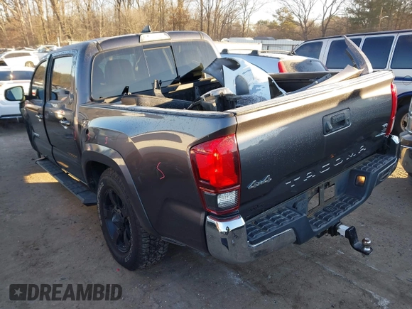 2018 Toyota Tacoma SR with VIN 5TFCZ5AN7JX154112, listed as a IAAI auction lot 41394058 with 158,045 mi miles. Bid and sale history available at carsss.com. Image 3.