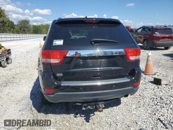2013 Jeep Grand Cherokee Overland with VIN 1C4RJECG5DC595989, listed as a Copart auction lot 73385354 with 157,876 mi miles and Clean Title. Bid and sale history available at carsss.com. Image 6.