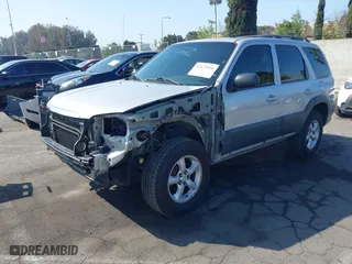 2006 Mazda Tribute i with VIN 4F2YZ02Z26KM38777, listed as a IAAI auction lot 41673856 with 165,665 mi miles. Bid and sale history available at carsss.com. Image 20.