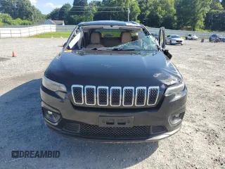 2019 Jeep Cherokee Latitude с VIN 1C4PJLCB7KD270350, выставлен на аукционе Copart как лот 61366925 с пробегом 127 027 миль миль и Списание • Salvage title. История ставок и продаж доступна на DreamBid. Изображение 5.
