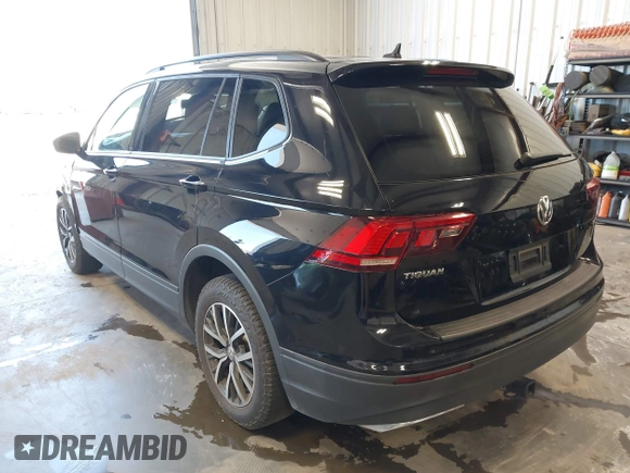 2021 Volkswagen Tiguan S with VIN 3VV0B7AX8MM020189, listed as a IAAI auction lot 42615767 with 70,294 mi miles and . Bid and sale history available at DreamBid. Image 3.