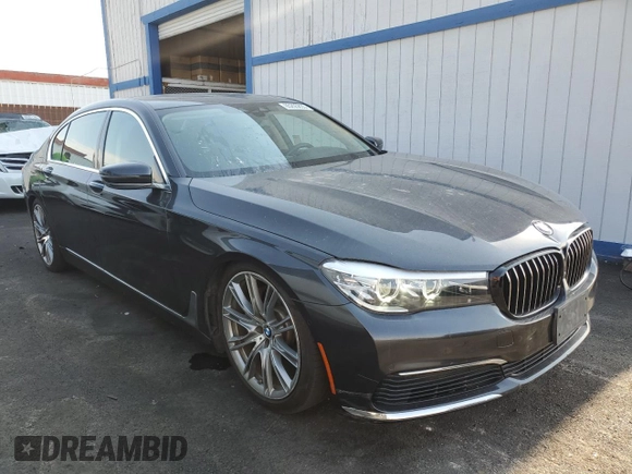 2019 BMW 7 Series 740i with VIN WBA7E2C52KB217153, listed as a Copart auction lot 65205835 with 61,981 mi miles and Clean title. Bid and sale history available at DreamBid. Image 4.