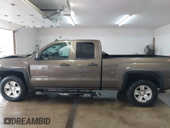 2014 Chevrolet Silverado 1500 LT with VIN 1GCVKREC5EZ147506, listed as a IAAI auction lot 41736960 with 112,399 mi miles and . Bid and sale history available at DreamBid. Image 15.