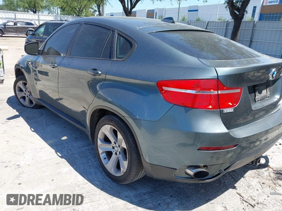 2012 BMW X6 35i z VIN 5UXFG2C53CL782126, wystawiony jako IAAI lot #42005838 z przebiegiem 124 646 mil mil oraz . Historia ofert i sprzedaży dostępna na DreamBid. Obrazek 3.