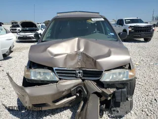 2003 Honda Odyssey LX z VIN 5FNRL18503B004270, wystawiony jako Copart lot #50307625 z przebiegiem 93 822 mil mil oraz Szkody całkowita. Historia ofert i sprzedaży dostępna na DreamBid. Obrazek 5.