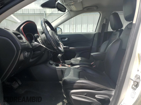 2020 Jeep Compass Trailhawk with VIN 3C4NJDDB1LT189240, listed as a Copart auction lot 57876235 with 70,309 mi miles and Salvage title. Bid and sale history available at DreamBid. Image 7.