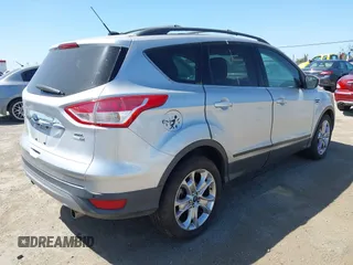 2013 Ford Escape SEL with VIN 1FMCU9HXXDUC17184, listed as a IAAI auction lot 42088020 with 63,151 mi miles. Bid and sale history available at carsss.com. Image 4.