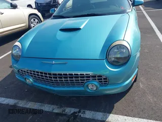 2002 Ford Thunderbird Hardtop Premium z VIN 1FAHP60AX2Y118061, wystawiony jako IAAI lot #42332263 z przebiegiem 162 591 mil mil oraz . Historia ofert i sprzedaży dostępna na DreamBid. Obrazek 12.