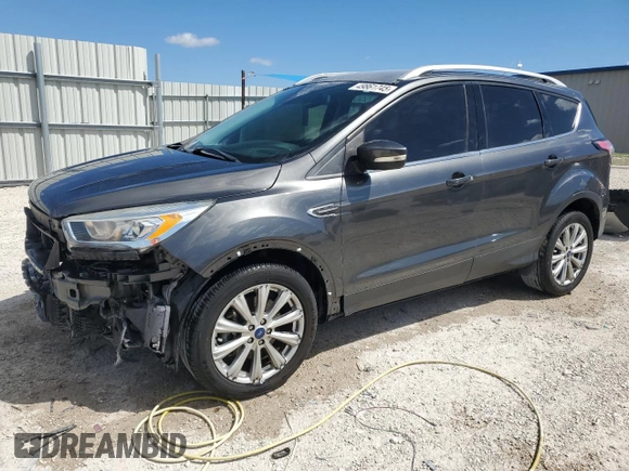 2017 Ford Escape Titanium with VIN 1FMCU0J95HUF02694, listed as a Copart auction lot 49861745 with 114,602 mi miles and Salvage Title. Bid and sale history available at DreamBid. Image 1.