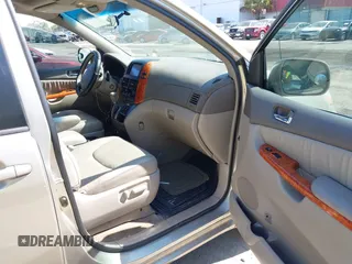 2010 Toyota Sienna XLE with VIN 5TDYK4CC5AS292110, listed as a IAAI auction lot 42055505 with 107,390 mi miles. Bid and sale history available at carsss.com. Image 5.