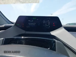 2024 Toyota Prius SE z VIN JTDACACU1R3033326, wystawiony jako IAAI lot #42174204 z przebiegiem 11 273 mil mil oraz . Historia ofert i sprzedaży dostępna na DreamBid. Obrazek 7.