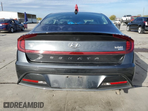 2022 Hyundai Sonata Hybrid Blue with VIN KMHL24JJ5NA051528, listed as a Copart auction lot 82478744 with 66,784 mi miles and Salvage Title. Bid and sale history available at carsss.com. Image 6.