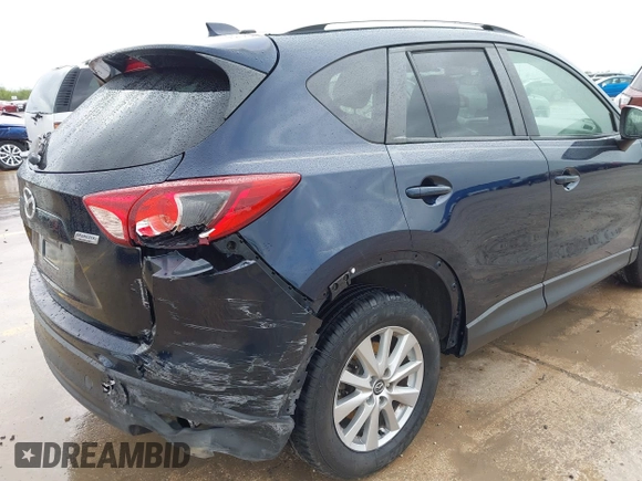 2015 Mazda CX-5 Touring with VIN JM3KE2CY5F0449195, listed as a IAAI auction lot 41894567 with 124,694 mi miles and . Bid and sale history available at DreamBid. Image 6.