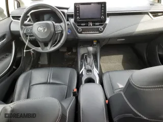 2021 Toyota Corolla Hybrid with VIN JTDBAMDE2MJ021418, listed as a Copart auction lot 52736295 with 92,061 mi miles and Salvage Title. Bid and sale history available at carsss.com. Image 8.