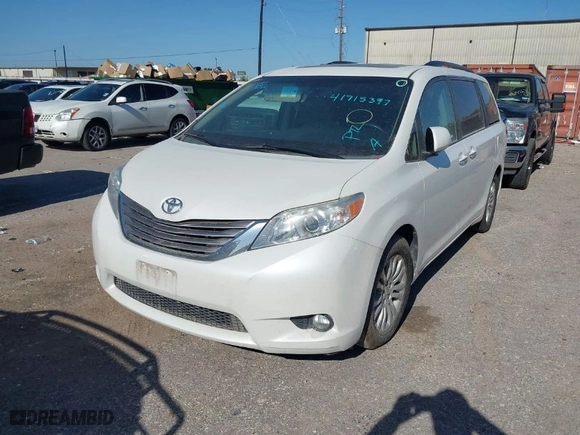 2015 Toyota Sienna XLE with VIN 5TDYK3DC2FS540586, listed as a IAAI auction lot 41715397 with 83,016 mi miles. Bid and sale history available at carsss.com. Image 2.