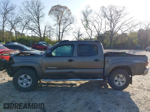 2014 Toyota Tacoma with VIN 3TMLU4EN3EM163162, listed as a IAAI auction lot 41930392 with 167,368 mi miles and . Bid and sale history available at DreamBid. Image 15.
