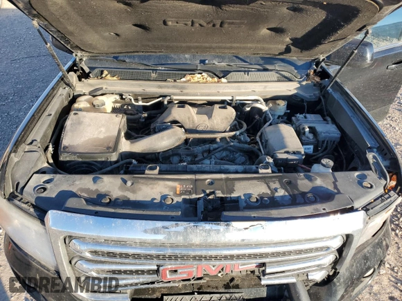 2015 GMC Canyon 4WD SLE with VIN 1GTH6BE37F1133213, listed as a Copart auction lot 82404014 with 142,149 mi miles and Salvage Title. Bid and sale history available at carsss.com. Image 11.