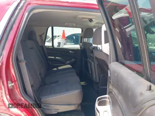 2015 Chevrolet Tahoe LS with VIN 1GNSCAEC4FR121571, listed as a IAAI auction lot 42499156 with 131,284 mi miles and . Bid and sale history available at DreamBid. Image 8.