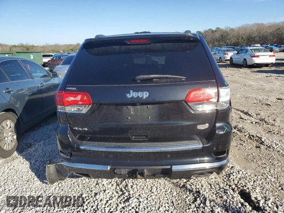 2015 Jeep Grand Cherokee Summit with VIN 1C4RJFJG0FC700014, listed as a Copart auction lot 42981765 with 144,937 mi miles and Salvage Title. Bid and sale history available at DreamBid. Image 6.