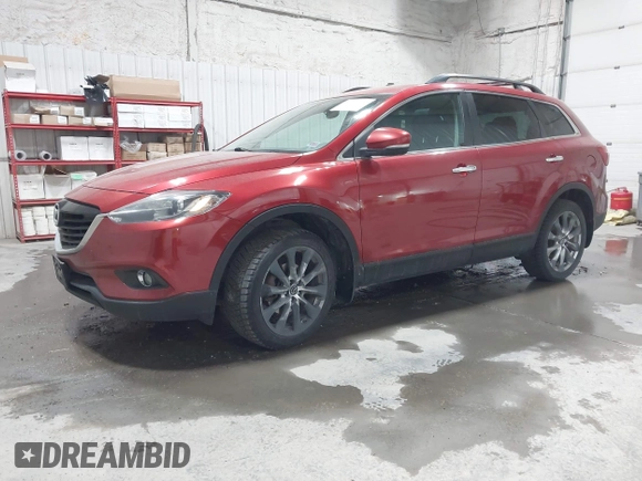 2015 Mazda CX-9 Grand Touring z VIN JM3TB3DAXF0464215, wystawiony jako IAAI lot #42043092 z przebiegiem 119 269 mil mil oraz . Historia ofert i sprzedaży dostępna na DreamBid. Obrazek 2.