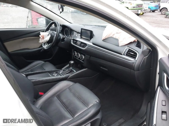 2016 Mazda Mazda6 i Sport with VIN JM1GJ1U52G1431967, listed as a IAAI auction lot 41602804 with 130,579 mi miles. Bid and sale history available at carsss.com. Image 5.