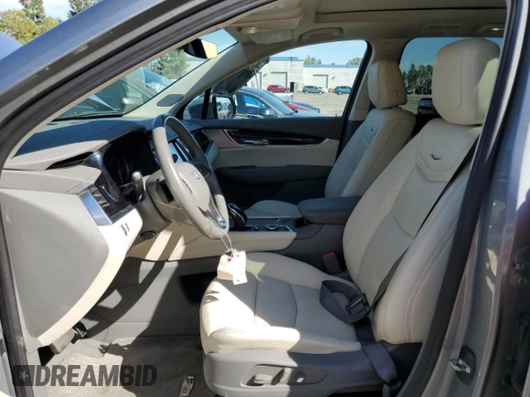 2023 Cadillac XT6 FWD Premium Luxury z VIN 1GYKPCRS5PZ212337, wystawiony jako Copart lot #46283655 z przebiegiem 15 660 mil mil oraz Szkody całkowita. Historia ofert i sprzedaży dostępna na DreamBid. Obrazek 7.