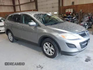 2011 Mazda CX-9 Touring z VIN JM3TB3CV2B0331219, wystawiony jako IAAI lot #42408797 z przebiegiem 115 377 mil mil oraz . Historia ofert i sprzedaży dostępna na DreamBid. Obrazek 1.