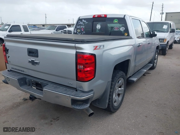 2014 Chevrolet Silverado 1500 LTZ with VIN 3GCUKSEC9EG228849, listed as a IAAI auction lot 41940320 with 165,630 mi miles. Bid and sale history available at carsss.com. Image 4.