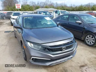 2019 Honda Civic LX with VIN 19XFC2F61KE037495, listed as a IAAI auction lot 41891007 with 90,262 mi miles and . Bid and sale history available at DreamBid. Image 1.