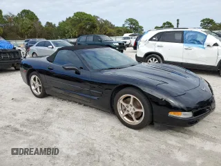 2002 Chevrolet Corvette with VIN 1G1YY32G325123703, listed as a Copart auction lot 77258804 with 26,325 mi miles and Salvage Title. Bid and sale history available at carsss.com. Image 4.