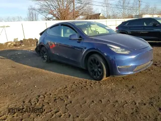 2021 Tesla Model Y Long Range with VIN 5YJYGAEE2MF262571, listed as a Copart auction lot 47309485 with 57,431 mi miles and Salvage Title. Bid and sale history available at carsss.com. Image 10.