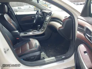 2013 Chevrolet Malibu LTZ with VIN 1G11H5SA5DF141674, listed as a IAAI auction lot 41933797 with 249,419 mi miles. Bid and sale history available at carsss.com. Image 5.