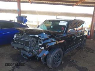 2014 Jeep Patriot Sport with VIN 1C4NJPBB7ED915924, listed as a IAAI auction lot 41641555 with 131,732 mi miles. Bid and sale history available at carsss.com. Image 2.