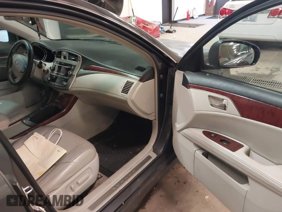 2011 Toyota Avalon with VIN 4T1BK3DB6BU432597, listed as a IAAI auction lot 41625819 with 233,536 mi miles and . Bid and sale history available at DreamBid. Image 5.