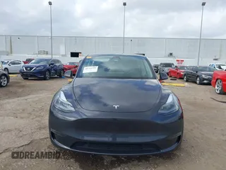 2024 Tesla Model Y Long Range with VIN 7SAYGDEE0RA261489, listed as a IAAI auction lot 41729325 with 5,060 mi miles. Bid and sale history available at carsss.com. Image 12.