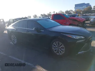 2022 Toyota Mirai XLE with VIN JTDAAAAA9NA007013, listed as a IAAI auction lot 41744965 with 23,243 mi miles and . Bid and sale history available at DreamBid. Image 13.