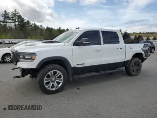 2020 Ram 1500 Rebel with VIN 1C6SRFLM1LN230872, listed as a Copart auction lot 55671585 with 97,202 mi miles and Salvage title. Bid and sale history available at DreamBid. Image 1.