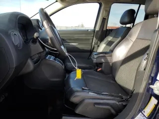 2014 Jeep Compass High Altitude with VIN 1C4NJCEA9ED678722, listed as a Copart auction lot 86573694 with 234,985 mi miles and Clean Title. Bid and sale history available at carsss.com. Image 7.