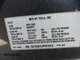 2023 Tesla Model Y Long Range with VIN 7SAYGDEE4PF875915, listed as a IAAI auction lot 42095178 with 11,928 mi miles and . Bid and sale history available at DreamBid. Image 9.