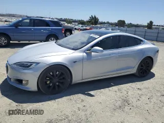 2016 Tesla Model S 90D с VIN 5YJSA1E23GF144496, выставлен на аукционе Copart как лот 64080845 с пробегом 34 847 миль миль и Списание • Salvage title. История ставок и продаж доступна на DreamBid. Изображение 1.