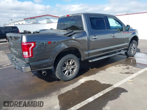 2015 Ford F-150 XLT with VIN 1FTEW1EG1FKE89277, listed as a IAAI auction lot 41752106 with 142,069 mi miles. Bid and sale history available at carsss.com. Image 4.