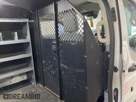 2018 Ford Transit z VIN 1FTYR1YG6JKA87506, wystawiony jako IAAI lot #42501070 z przebiegiem 167 892 mil mil oraz . Historia ofert i sprzedaży dostępna na DreamBid. Obrazek 21.