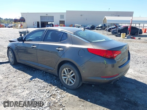 2013 Kia Optima LX with VIN 5XXGM4A74DG176057, listed as a IAAI auction lot 41826086 with 203,204 mi miles. Bid and sale history available at carsss.com. Image 3.