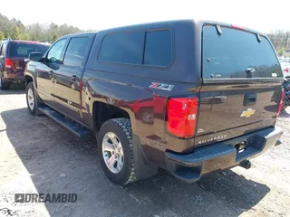 2016 Chevrolet Silverado 1500 LT with VIN 3GCUKREC3GG305792, listed as a IAAI auction lot 42083847 with 72,325 mi miles and . Bid and sale history available at DreamBid. Image 3.