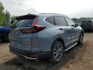 2020 Honda CR-V Touring z VIN 2HKRW2H9XLH236764, wystawiony jako Copart lot #59693475 z przebiegiem Nie podano mil oraz Czysty tytuł • Clean title. Historia ofert i sprzedaży dostępna na DreamBid. Obrazek 3.