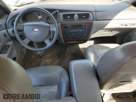 2005 Ford Taurus SEL with VIN 1FAFP56215A234943, listed as a Copart auction lot 51486595 with 222,307 mi miles and Salvage Title. Bid and sale history available at DreamBid. Image 8.