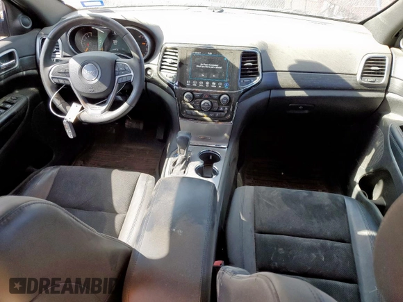 2019 Jeep Grand Cherokee Laredo E with VIN 1C4RJFAG3KC668153, listed as a Copart auction lot 54614005 with 111,511 mi miles and Salvage title. Bid and sale history available at DreamBid. Image 8.
