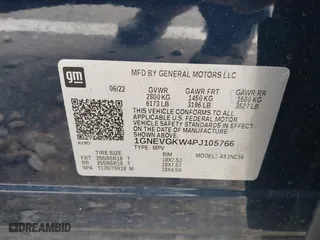 2023 Chevrolet Traverse LT Cloth with VIN 1GNEVGKW4PJ105766, listed as a IAAI auction lot 41015841 with 42,128 mi miles. Bid and sale history available at carsss.com. Image 9.