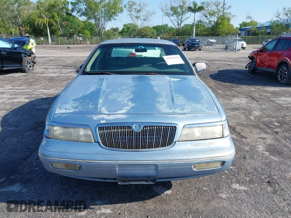 1997 Mercury Grand Marquis LS with VIN 2MELM75W7VX708034, listed as a IAAI auction lot 41878938 with 197,818 mi miles and . Bid and sale history available at DreamBid. Image 12.